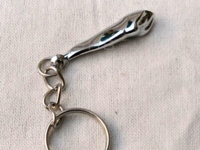 Canine tooth shaped keychain for dental promotions